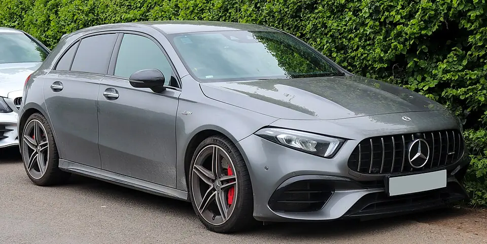 Grey Mercedes-AMG A 45 S hatchback, three-quarter front view