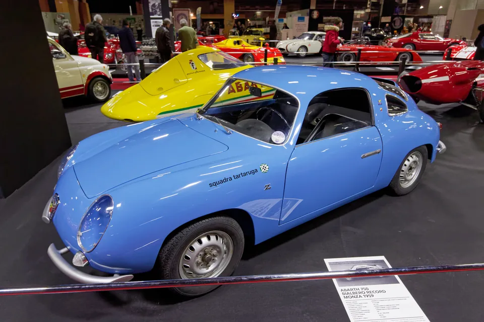 Light blue Fiat-Abarth 750 Record Monza Zagato, front three-quarter view, indoor car show