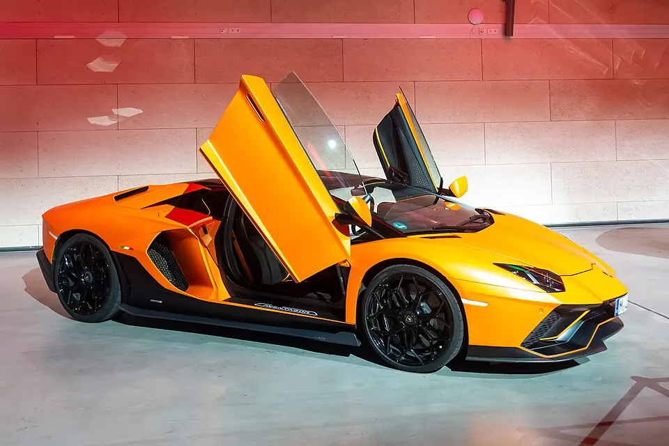 Orange Lamborghini Aventador, three-quarter front view