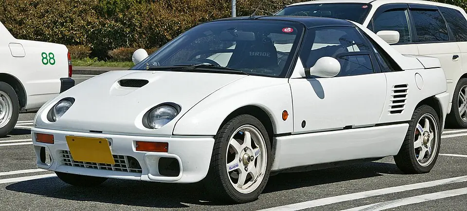 White Autozam AZ-1 kei car, three-quarter front view