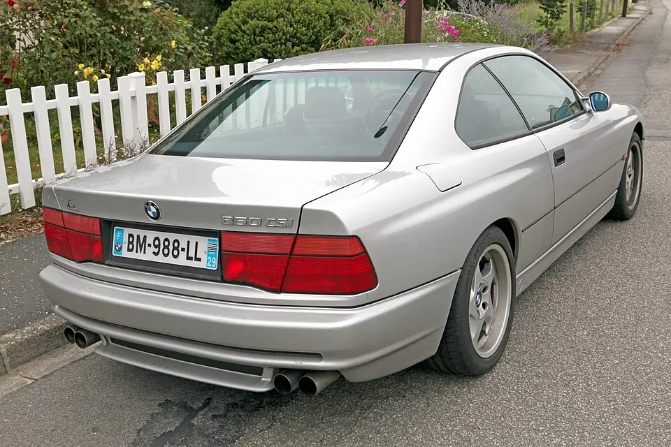 Silver BMW 850CSi, three-quarter rear view