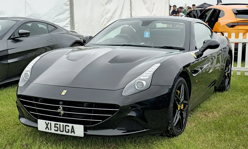 Black Ferrari California T, three-quarter front view