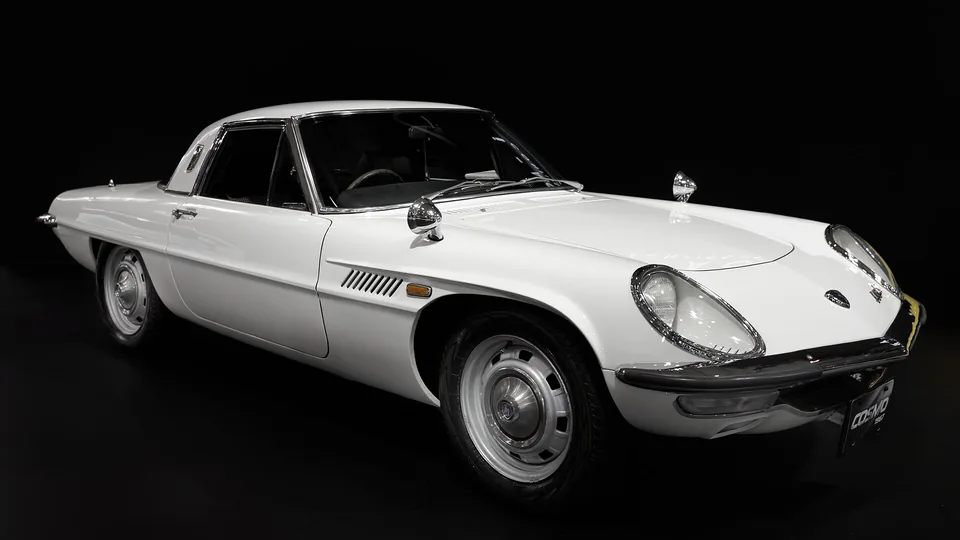 White Mazda Cosmo Sport 110S, three-quarter front view