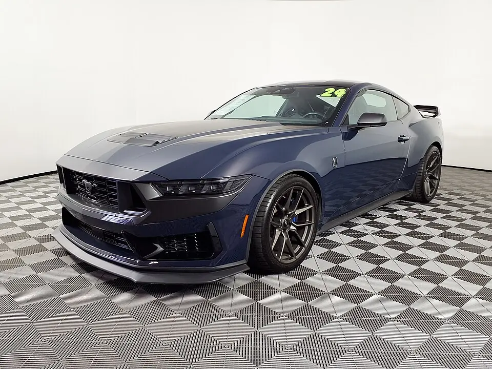 Dark blue Ford Mustang Dark Horse, three-quarter front view