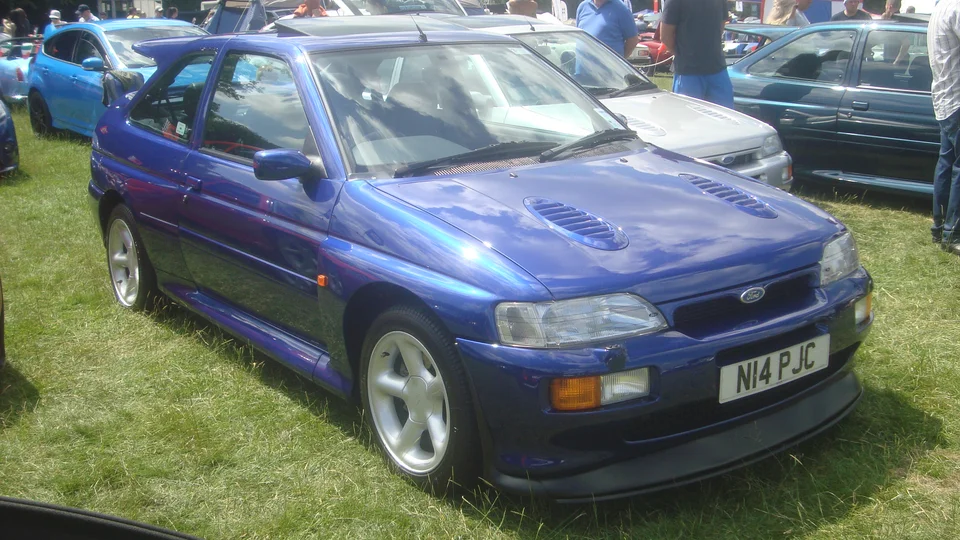 Blue Ford Escort RS Cosworth, three-quarter front view