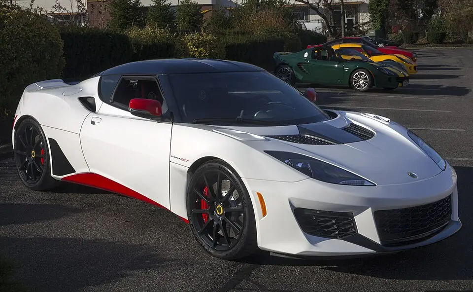 White Lotus Evora GT with red accents, three-quarter front view