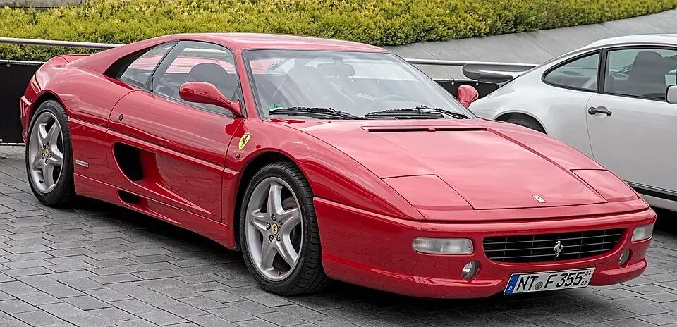 Red Ferrari F355 Berlinetta, three-quarter front view