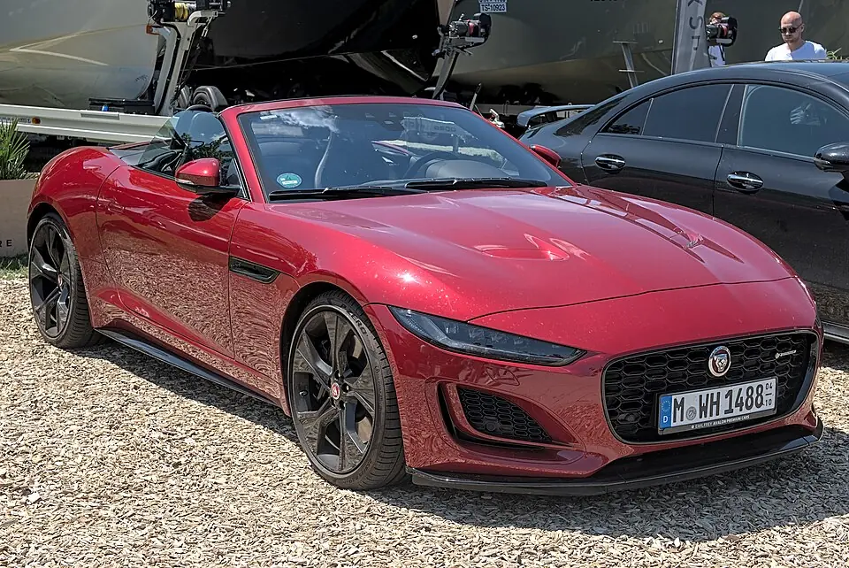 Green Jaguar F-Type R convertible, three-quarter front view