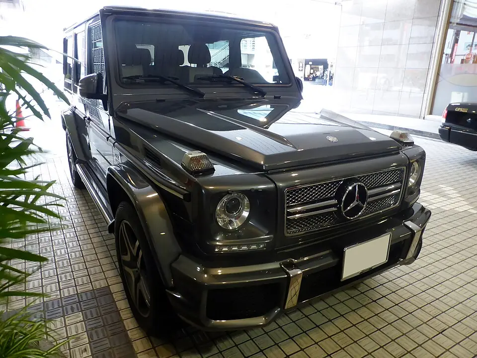 Dark grey Mercedes-AMG G65, three-quarter front view