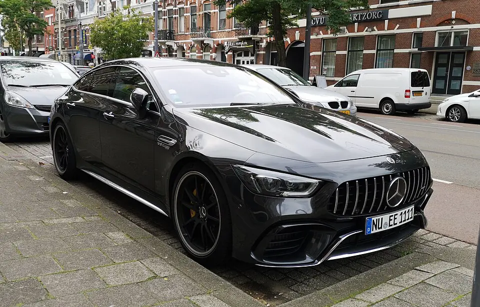 Black Mercedes-AMG GT 63 S 4-Door Coupe, three-quarter front view