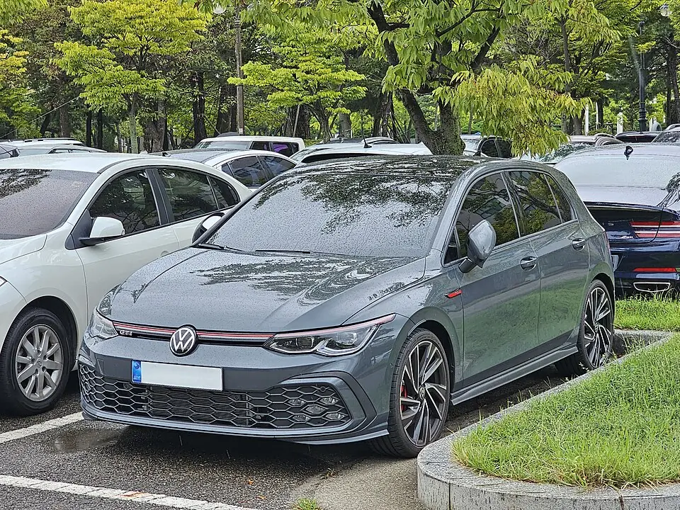Grey Volkswagen Golf GTI Mk8, three-quarter front view