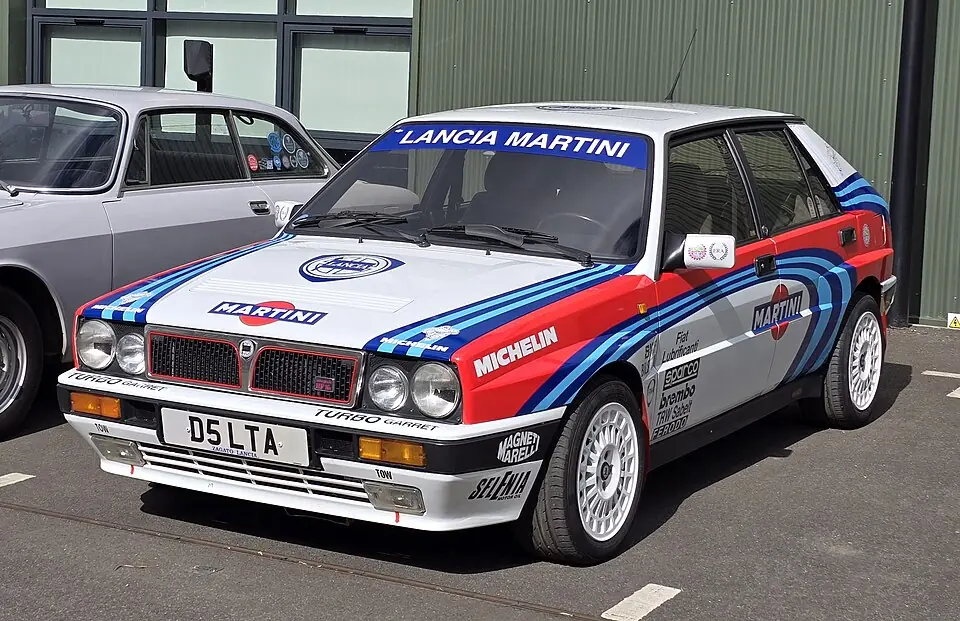 Red Lancia Delta HF Integrale 16v, three-quarter front view