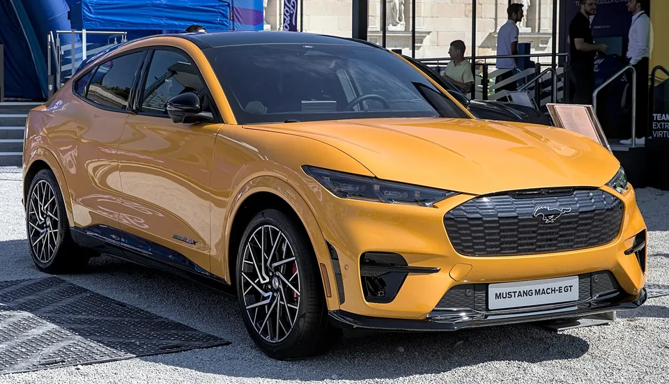 Cyber Orange Ford Mustang Mach-E GT, front three-quarter view