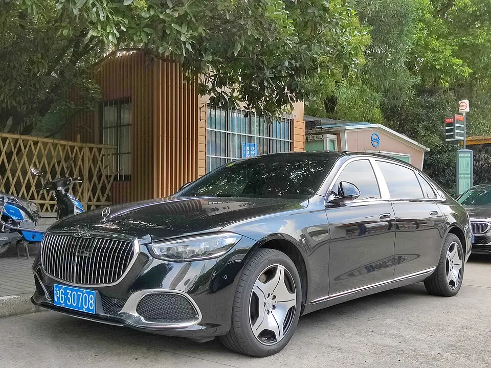 Black Mercedes-Maybach S-Class, three-quarter front view