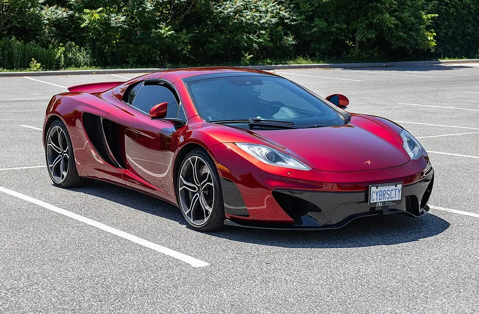 Red McLaren MP4-12C, three-quarter front view