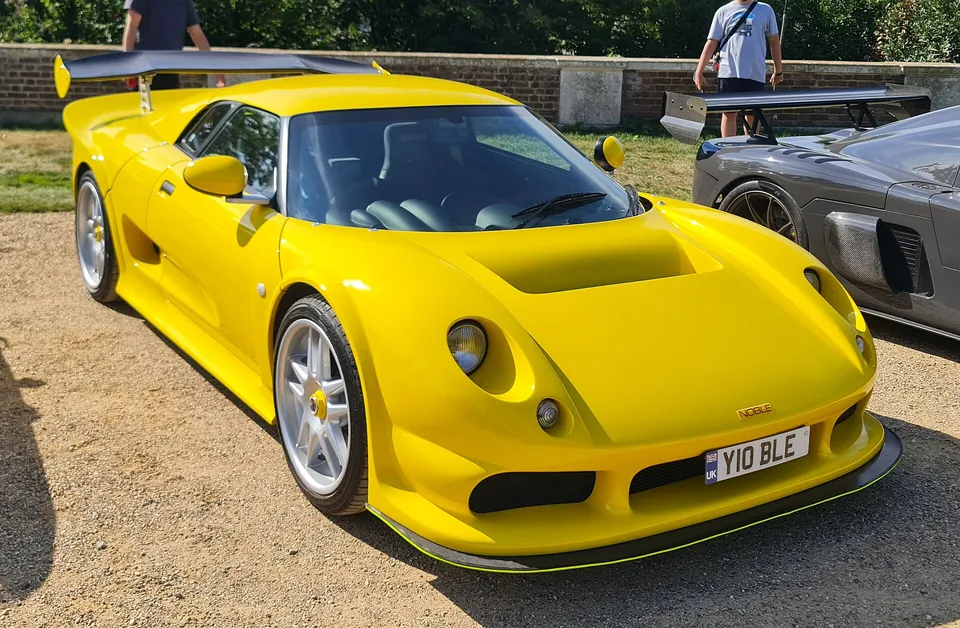 Yellow Noble M12 GTO, front three-quarter view