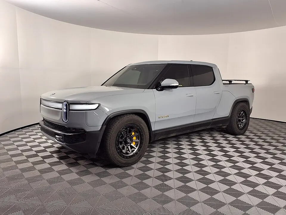 Grey Rivian R1T, three-quarter front view