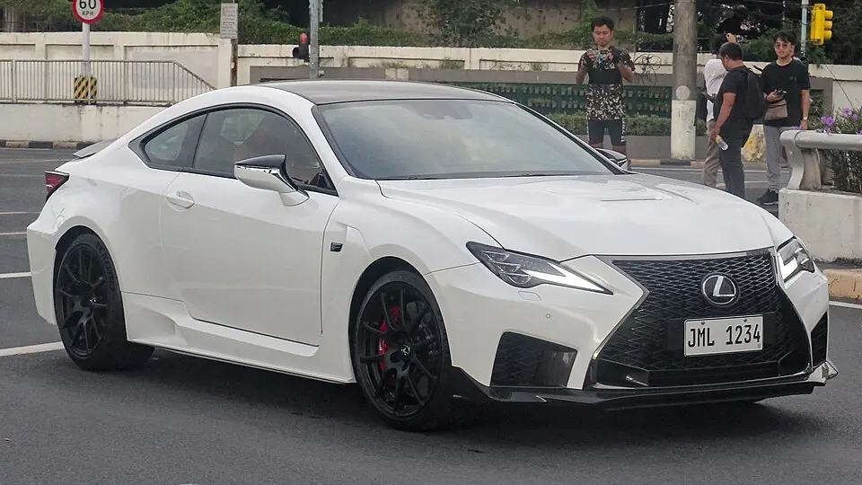 White Lexus RC F, three-quarter front view