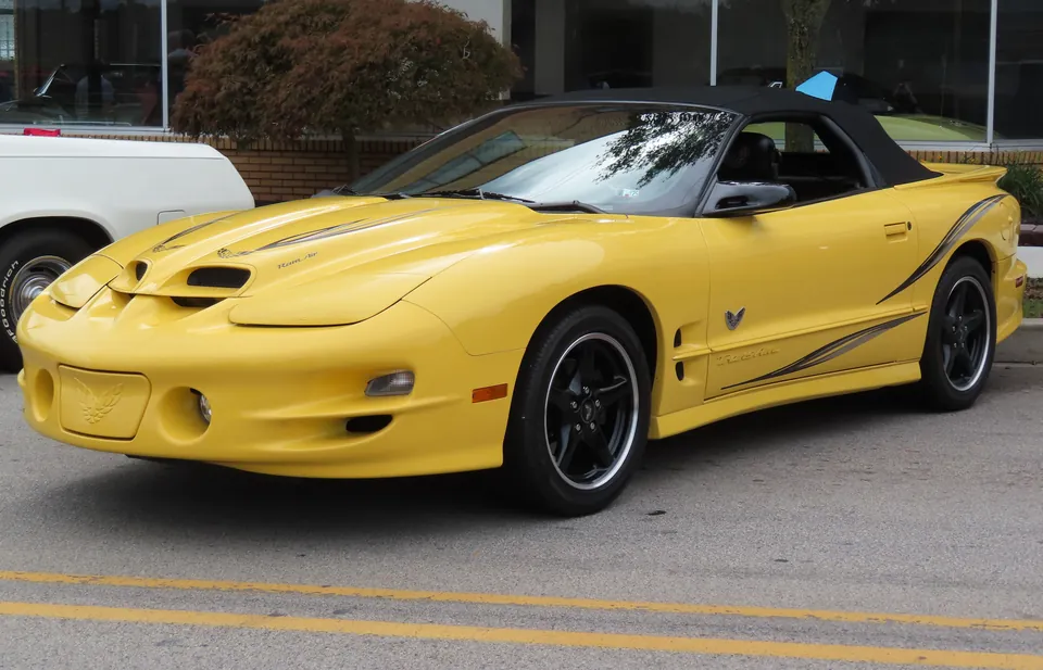 Yellow 2002 Pontiac Firebird Trans Am WS6 Collector Edition, front three-quarter view