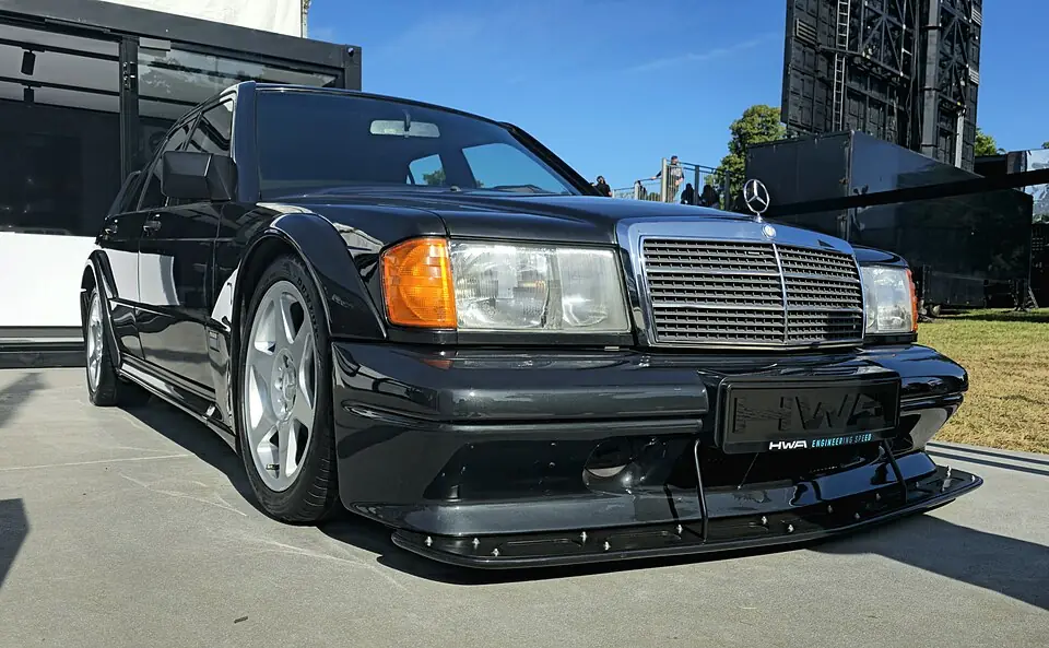 Black Mercedes-Benz 190E 2.5-16 Evolution II, three-quarter front view