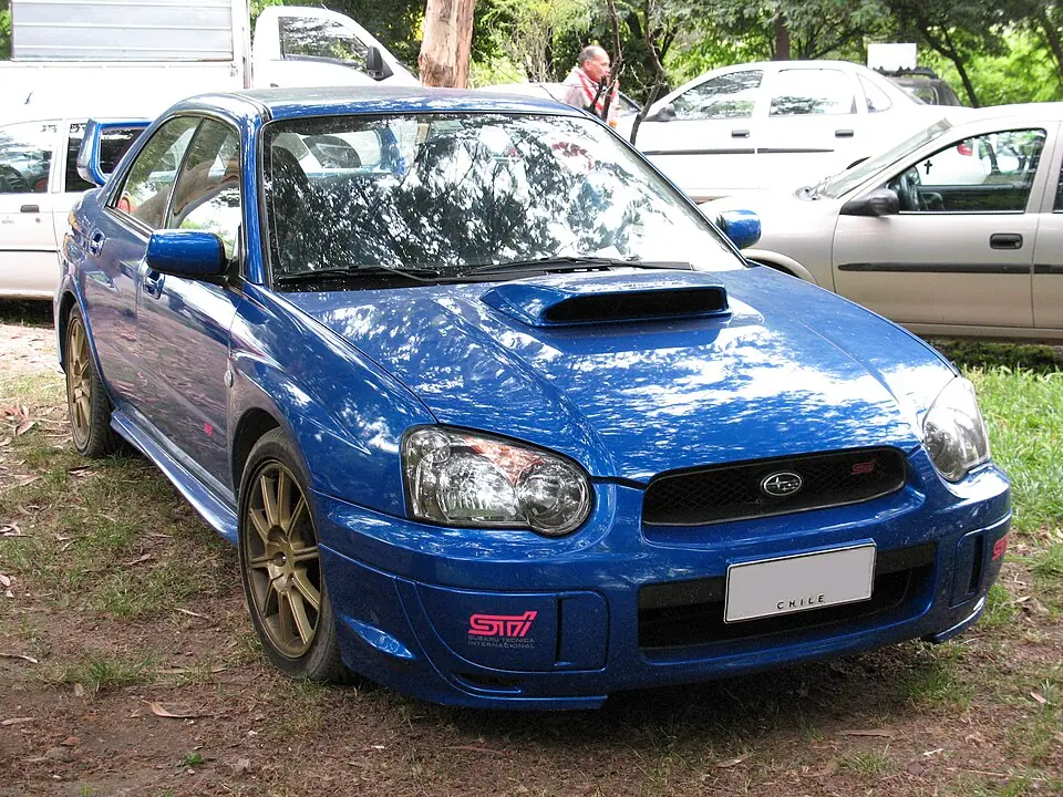 Blue Subaru Impreza WRX STI, three-quarter front view